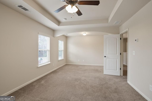 203 Creek View Ln, Acworth, GA 30102 - unfurnished room featuring carpet, a ceiling fan, arched walkways, a raised ceiling, and a smoke detector