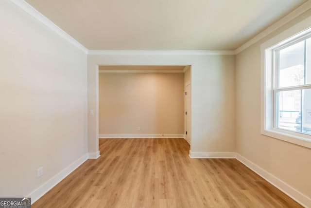 106 Henley St, Canton, GA 30114 - spare room with ornamental molding and light wood finished floors