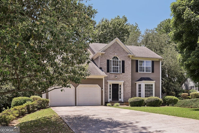 3850 Stepney Way, Cumming, GA 30041 - view of front of house featuring concrete driveway, a garage, roof with shingles, and brick siding