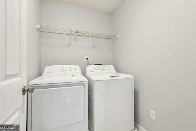 3850 Stepney Way, Cumming, GA 30041 - washroom featuring washing machine and clothes dryer