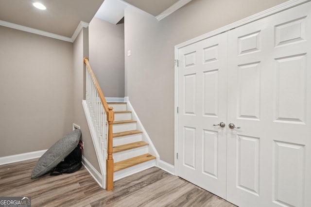 3850 Stepney Way, Cumming, GA 30041 - staircase featuring ornamental molding, wood finished floors, and recessed lighting
