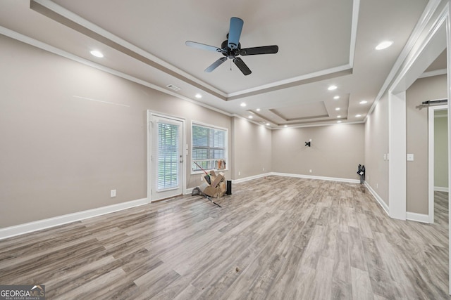 3850 Stepney Way, Cumming, GA 30041 - unfurnished room featuring a raised ceiling, light wood-style floors, crown molding, a ceiling fan, and recessed lighting