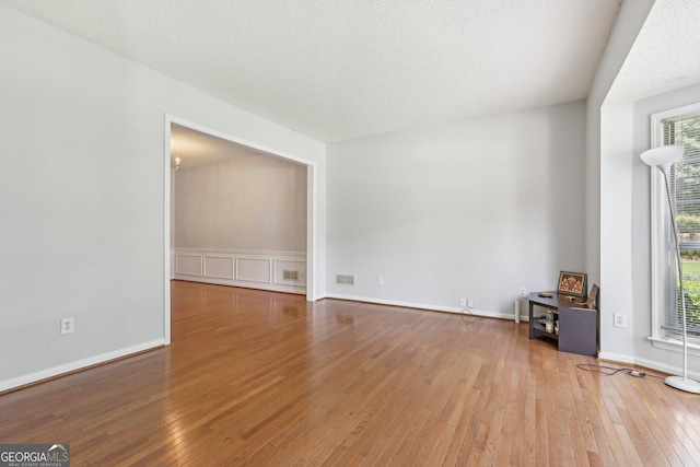 3850 Stepney Way, Cumming, GA 30041 - spare room featuring hardwood / wood-style floors