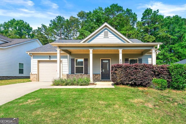 175 Orchard Ln, Covington, GA 30014 - view of front facade with driveway, an attached garage, a front lawn, and a porch