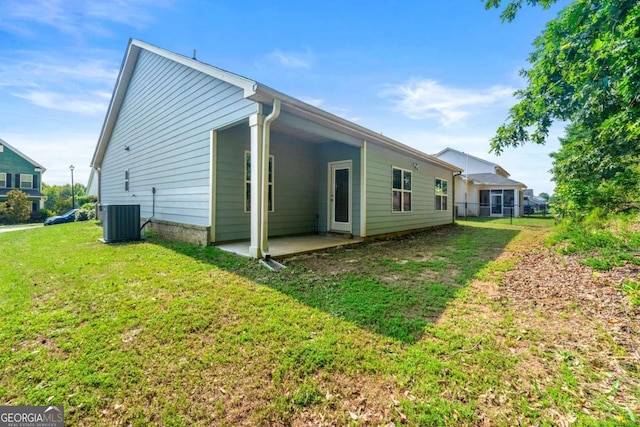 175 Orchard Ln, Covington, GA 30014 - view of home's exterior with cooling unit and a patio area