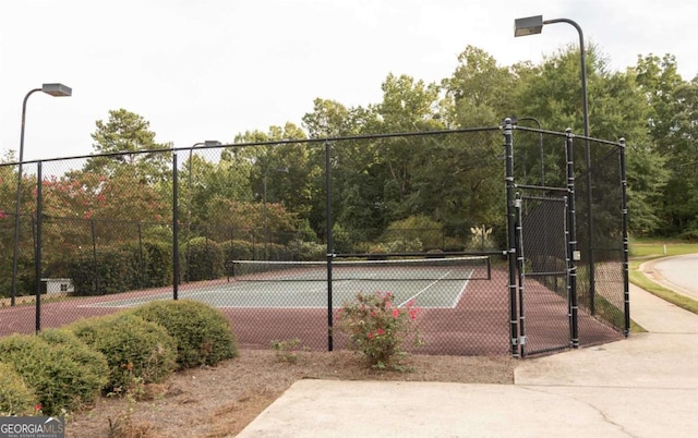 175 Orchard Ln, Covington, GA 30014 - view of tennis court featuring a gate