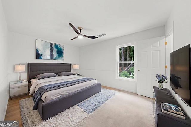 10865 Misty Moon Ct, Alpharetta, GA 30022 - bedroom with ceiling fan and wood finished floors