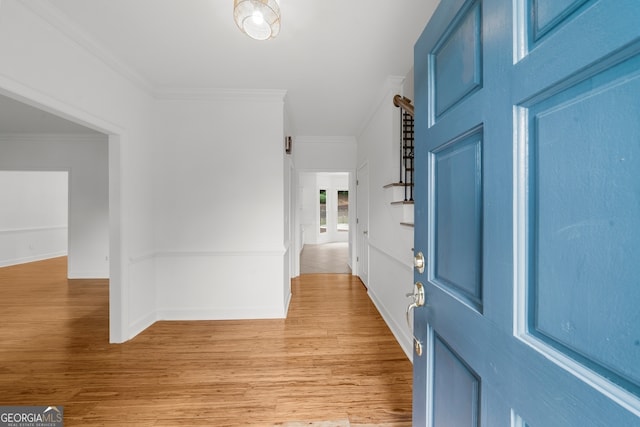 10865 Misty Moon Ct, Alpharetta, GA 30022 - foyer entrance featuring light wood-style flooring and ornamental molding