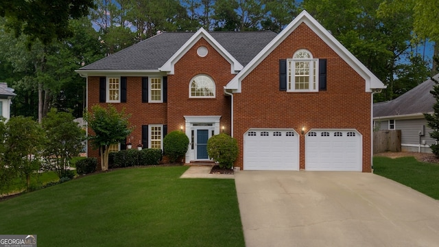 10865 Misty Moon Ct, Alpharetta, GA 30022 - view of front of home with a garage, concrete driveway, and brick siding