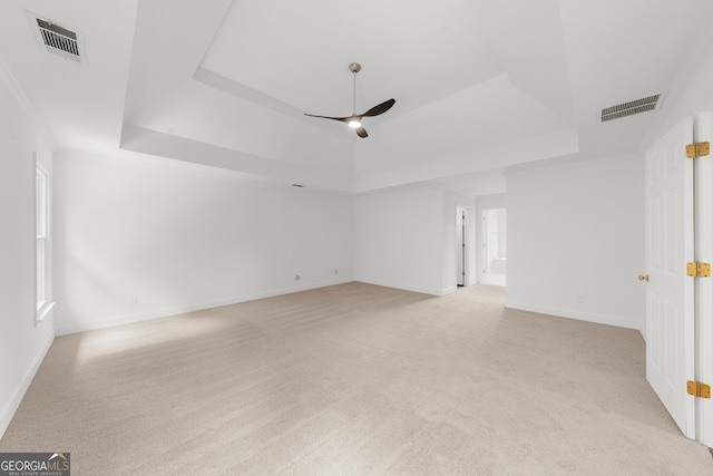 10865 Misty Moon Ct, Alpharetta, GA 30022 - unfurnished room featuring a tray ceiling, ceiling fan, light colored carpet, and baseboards