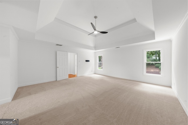 10865 Misty Moon Ct, Alpharetta, GA 30022 - unfurnished room with a raised ceiling, light colored carpet, ceiling fan, and baseboards