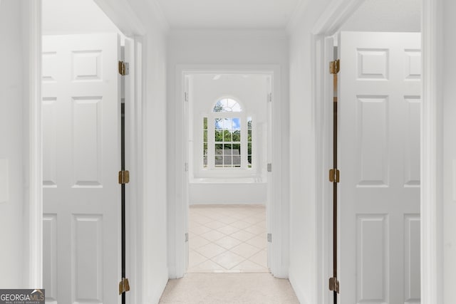 10865 Misty Moon Ct, Alpharetta, GA 30022 - corridor with ornamental molding, light tile patterned floors, and baseboards