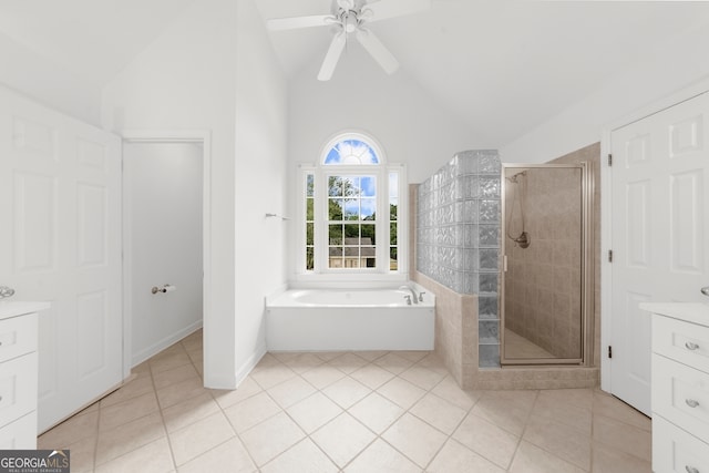 10865 Misty Moon Ct, Alpharetta, GA 30022 - full bath featuring a garden tub, a shower stall, vanity, tile patterned flooring, and high vaulted ceiling