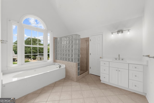 10865 Misty Moon Ct, Alpharetta, GA 30022 - bathroom featuring a garden tub, tile patterned floors, a stall shower, vanity, and high vaulted ceiling