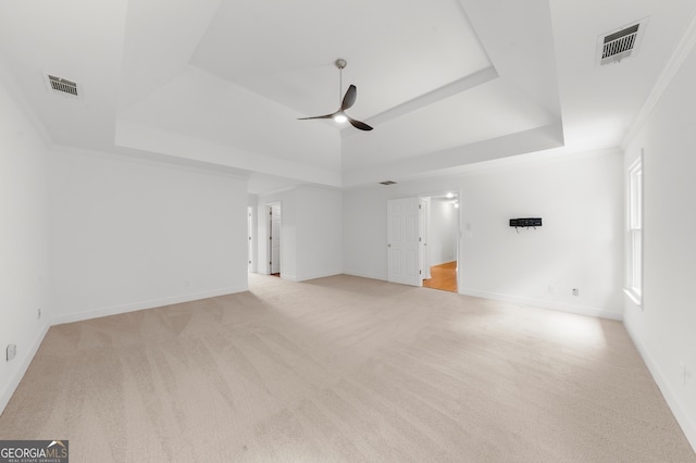 10865 Misty Moon Ct, Alpharetta, GA 30022 - unfurnished room with a tray ceiling, a ceiling fan, light carpet, and ornamental molding