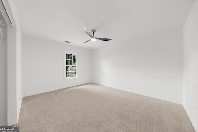 10865 Misty Moon Ct, Alpharetta, GA 30022 - unfurnished room with carpet flooring, ceiling fan, and baseboards