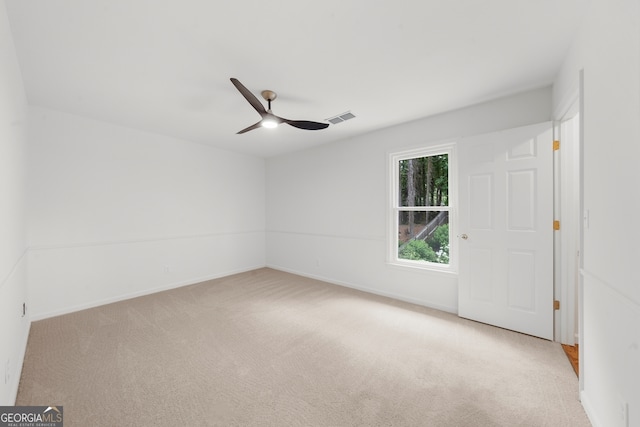10865 Misty Moon Ct, Alpharetta, GA 30022 - empty room featuring carpet, a ceiling fan, and baseboards