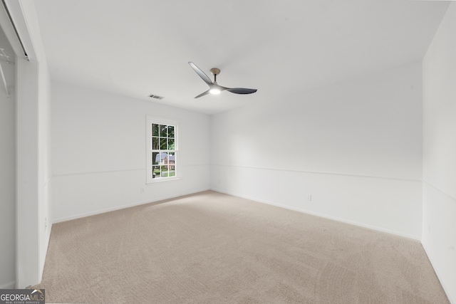 10865 Misty Moon Ct, Alpharetta, GA 30022 - carpeted spare room featuring ceiling fan and baseboards