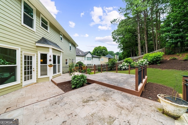 10865 Misty Moon Ct, Alpharetta, GA 30022 - fenced backyard with a patio and a residential view