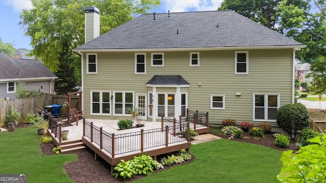 10865 Misty Moon Ct, Alpharetta, GA 30022 - rear view of house with a chimney, a shingled roof, and a deck