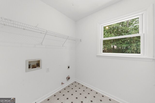 10865 Misty Moon Ct, Alpharetta, GA 30022 - laundry room with washer hookup, hookup for an electric dryer, hookup for a gas dryer, and light flooring