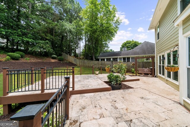 10865 Misty Moon Ct, Alpharetta, GA 30022 - fenced backyard with a patio