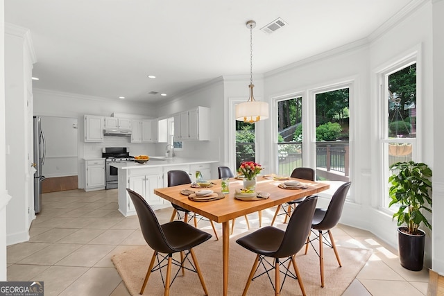 10865 Misty Moon Ct, Alpharetta, GA 30022 - dining area with light tile patterned floors, plenty of natural light, ornamental molding, and recessed lighting