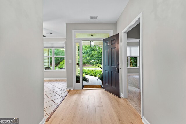 205 N Strathmore Dr, Sharpsburg, GA 30277 - entrance foyer with baseboards and wood finished floors