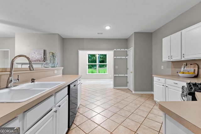 205 N Strathmore Dr, Sharpsburg, GA 30277 - kitchen with a sink, white cabinetry, light tile patterned floors, dishwasher, and light countertops
