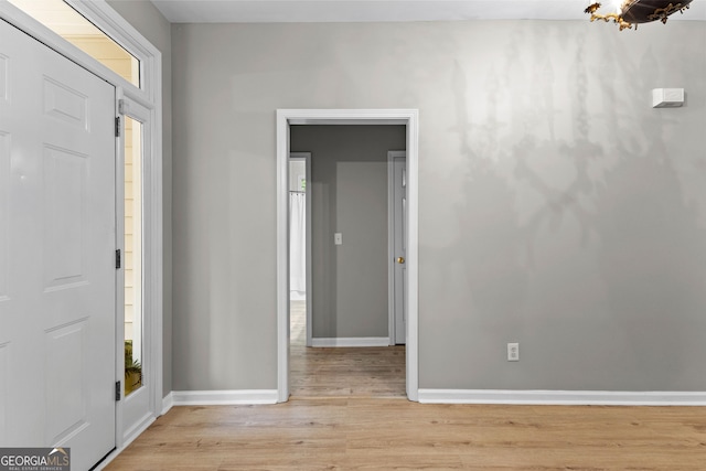 205 N Strathmore Dr, Sharpsburg, GA 30277 - foyer with light wood finished floors and baseboards