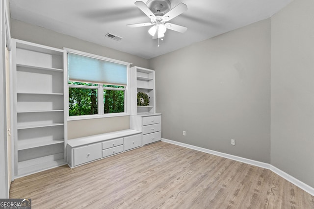 205 N Strathmore Dr, Sharpsburg, GA 30277 - unfurnished bedroom with light wood-type flooring, baseboards, and ceiling fan