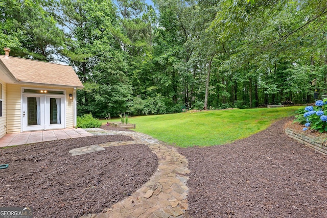 205 N Strathmore Dr, Sharpsburg, GA 30277 - view of grassy yard with a patio