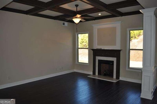 920 Crescent Ridge Dr, Buford, GA 30518 - unfurnished living room with a ceiling fan, plenty of natural light, decorative columns, coffered ceiling, and dark wood-type flooring