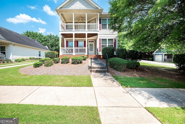 65 Orchard Dr, Covington, GA 30014 - townhome / multi-family property with a porch, a balcony, and ceiling fan