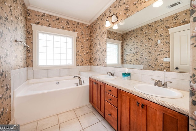 65 Orchard Dr, Covington, GA 30014 - bathroom featuring crown molding, tile patterned floors, a garden tub, double vanity, and wallpapered walls