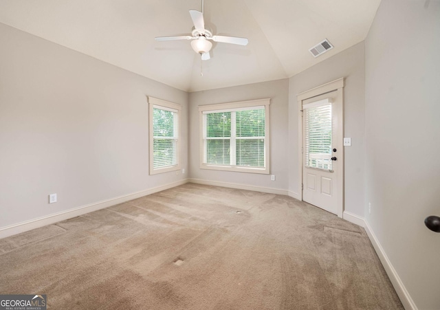 65 Orchard Dr, Covington, GA 30014 - carpeted empty room featuring ceiling fan, baseboards, and lofted ceiling