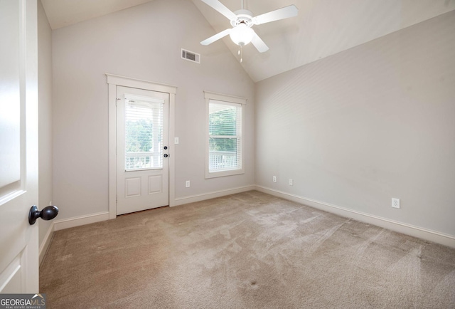 65 Orchard Dr, Covington, GA 30014 - spare room with a ceiling fan, carpet floors, baseboards, and high vaulted ceiling