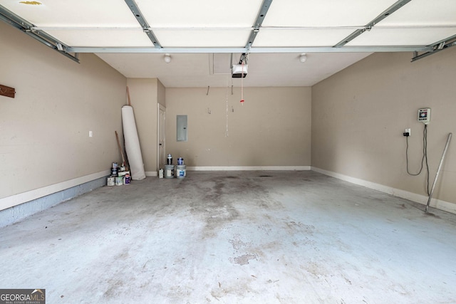 65 Orchard Dr, Covington, GA 30014 - garage with electric panel and a garage door opener