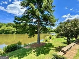 65 Orchard Dr, Covington, GA 30014 - view of yard featuring a water view
