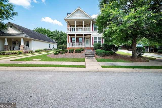 65 Orchard Dr, Covington, GA 30014 - multi unit property with covered porch, a balcony, and a chimney