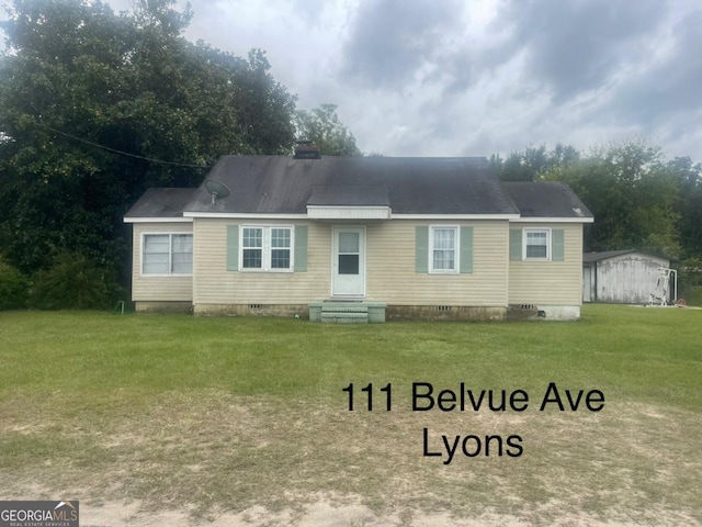 000375 Brooks Kirkland Rd, Vidalia, GA 30474 - view of front of home with a front lawn, crawl space, a chimney, and entry steps