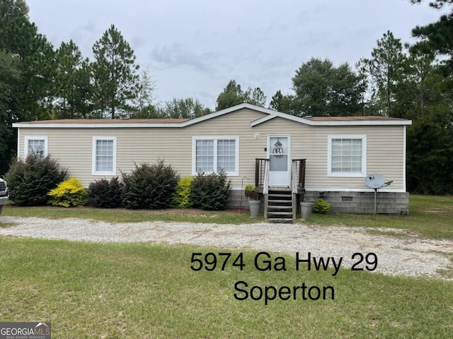 000375 Brooks Kirkland Rd, Vidalia, GA 30474 - manufactured / mobile home with a front lawn