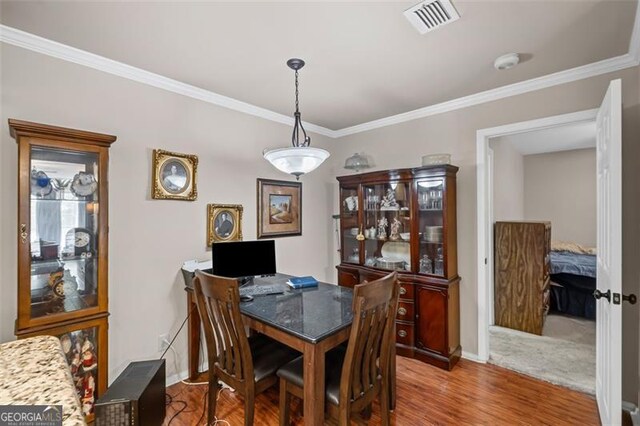 202 Berkeley Woods Dr, Duluth, GA 30096 - dining room featuring crown molding, wood finished floors, and baseboards