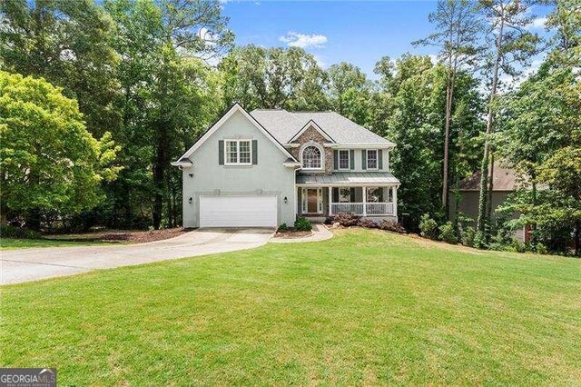 2342 Tall Timbers Ln, Marietta, GA 30066 - traditional-style house featuring concrete driveway, a porch, a garage, a front yard, and stucco siding