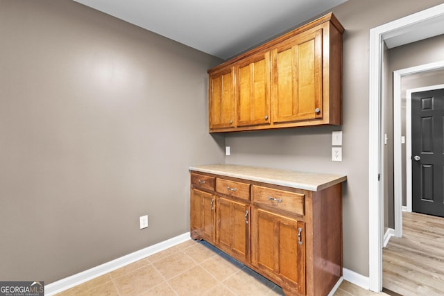 810 Callaway Church Rd, Lagrange, GA 30241 - kitchen featuring brown cabinetry and light countertops