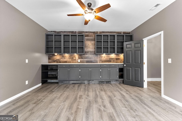 810 Callaway Church Rd, Lagrange, GA 30241 - bar featuring a ceiling fan, backsplash, and light wood finished floors