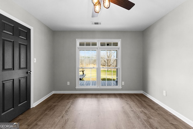 810 Callaway Church Rd, Lagrange, GA 30241 - spare room with a ceiling fan and dark wood-style floors