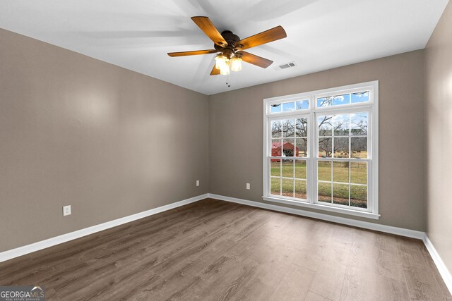 810 Callaway Church Rd, Lagrange, GA 30241 - spare room with dark wood-style flooring and a ceiling fan