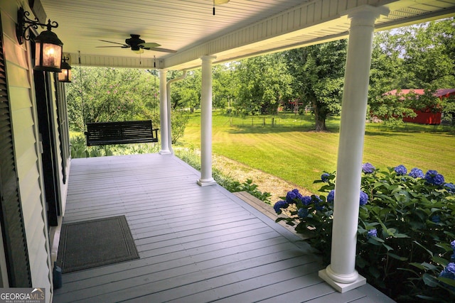 810 Callaway Church Rd, Lagrange, GA 30241 - porch featuring ceiling fan, a lawn, and view of scattered trees