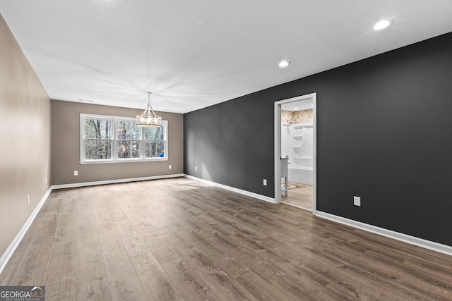 810 Callaway Church Rd, Lagrange, GA 30241 - unfurnished room with a chandelier, wood finished floors, and recessed lighting